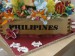 Philippines a květiny, na podložce názvy květin na bílých okvětních lístečcích